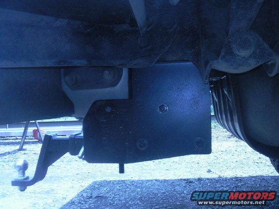Trailer hitch receiver and ball mount attached to vehicle frame